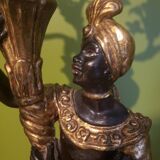 Paire de nubiens porte torchère en bois doré baroque