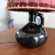 Vintage black ceramic lamp with hand-woven wool shade