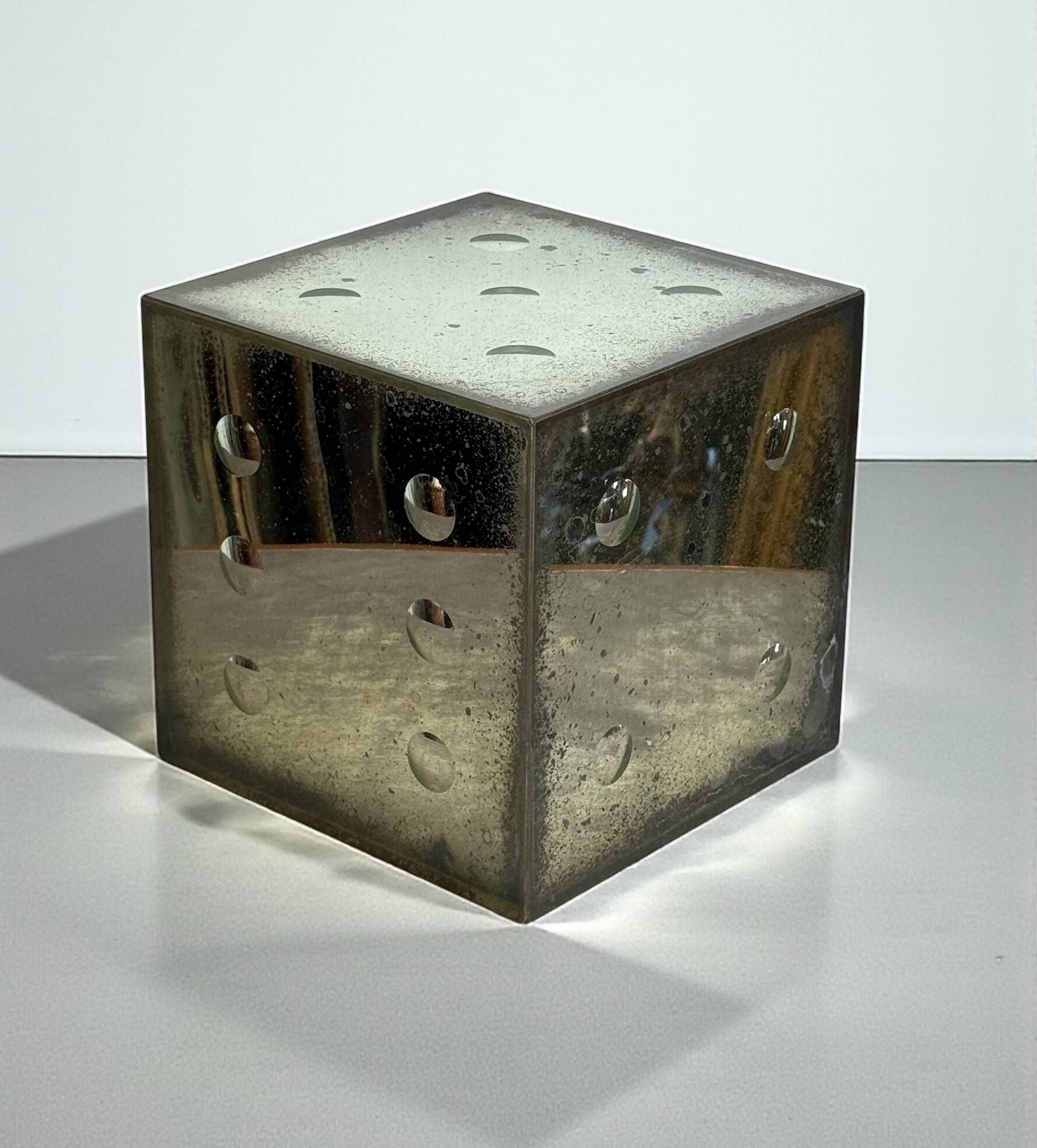 Large aged glass dice from the 70s with bubble shaped numbers