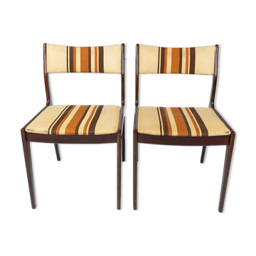 Pair of chairs in dark wood upholstered with light striped fabric of danish design