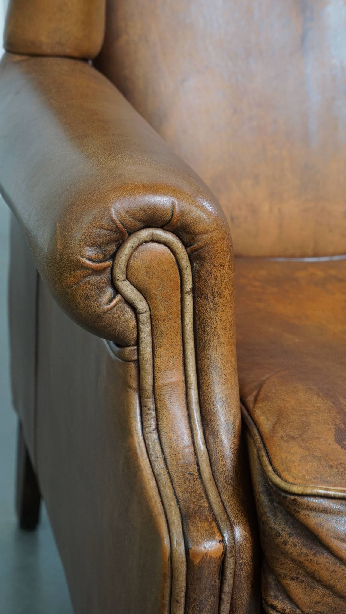 Fauteuil à oreilles vintage en cuir de mouton
