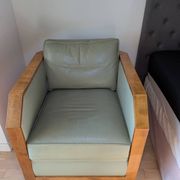Vintage armchair Hugues Chevalier Paris — Almond green leather & Wood