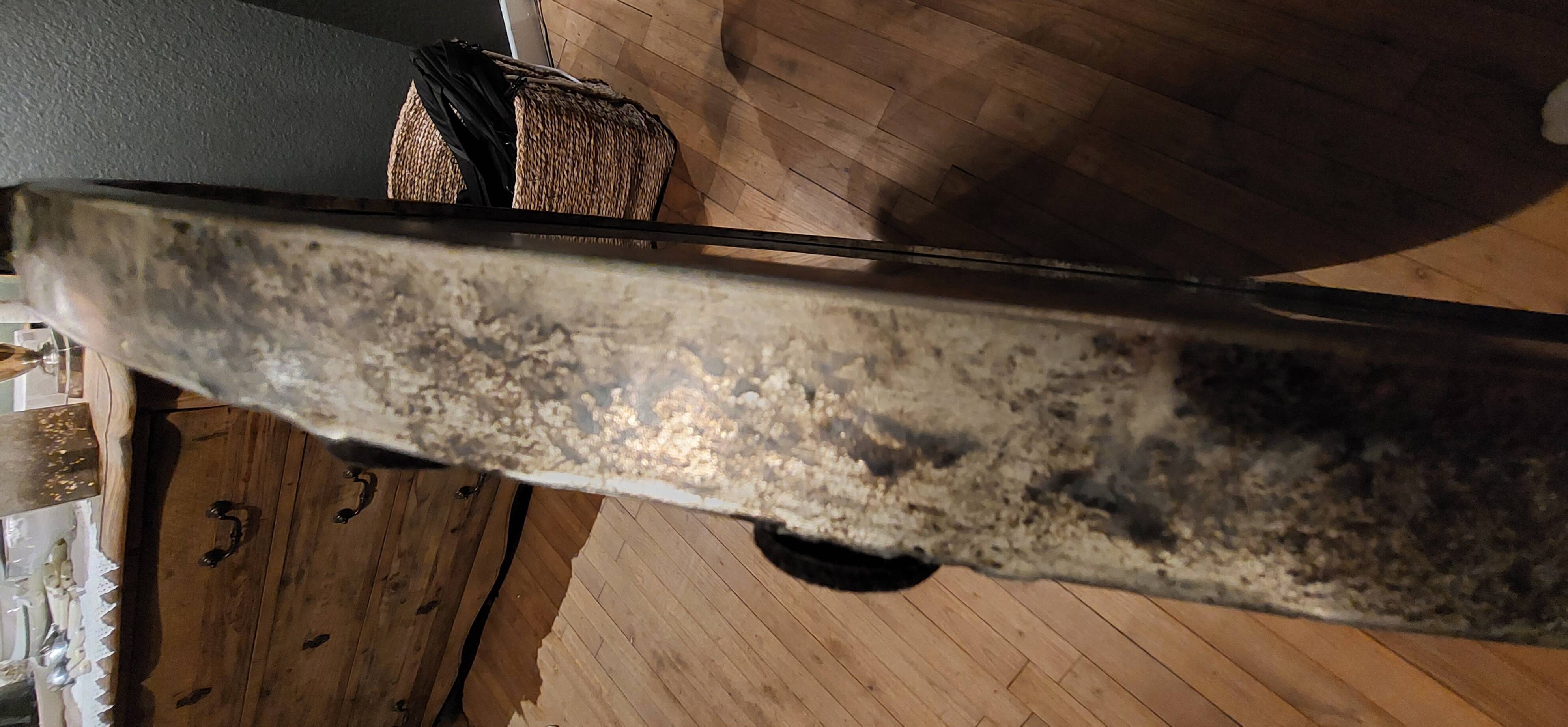 Round patinated mirror