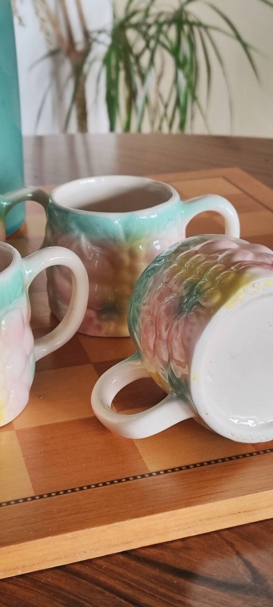 Set of 4 vintage multicoloured slipware coffee cups.