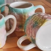 Set of 4 vintage multicoloured slipware coffee cups.