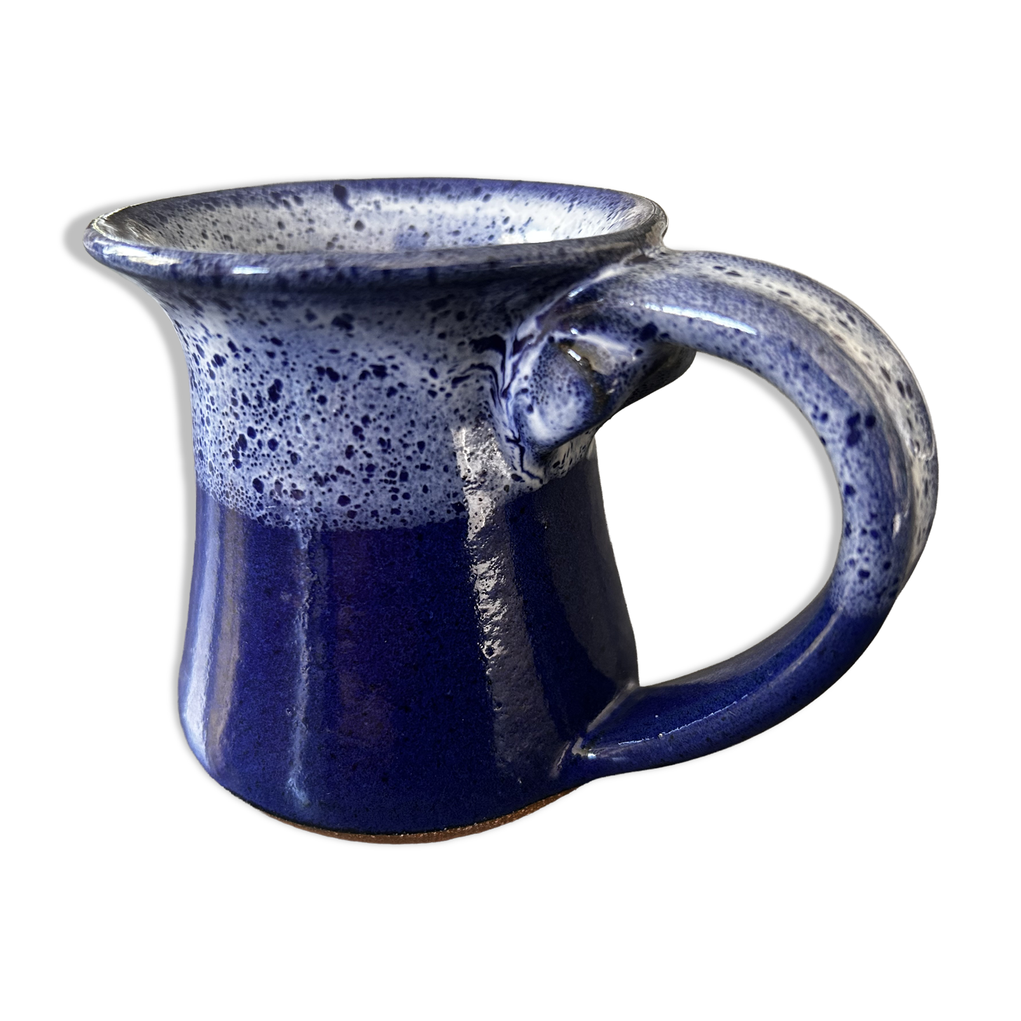 Small enamelled earthenware milk jug