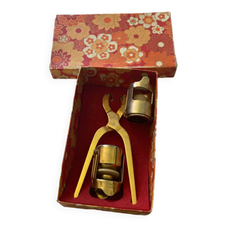 Vintage champagne tongs and corks box