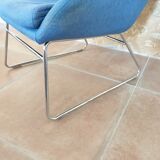 Armchair and its footrest