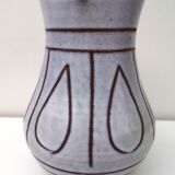 Vintage pitcher in enamelled earth