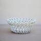 Woven ceramic basket