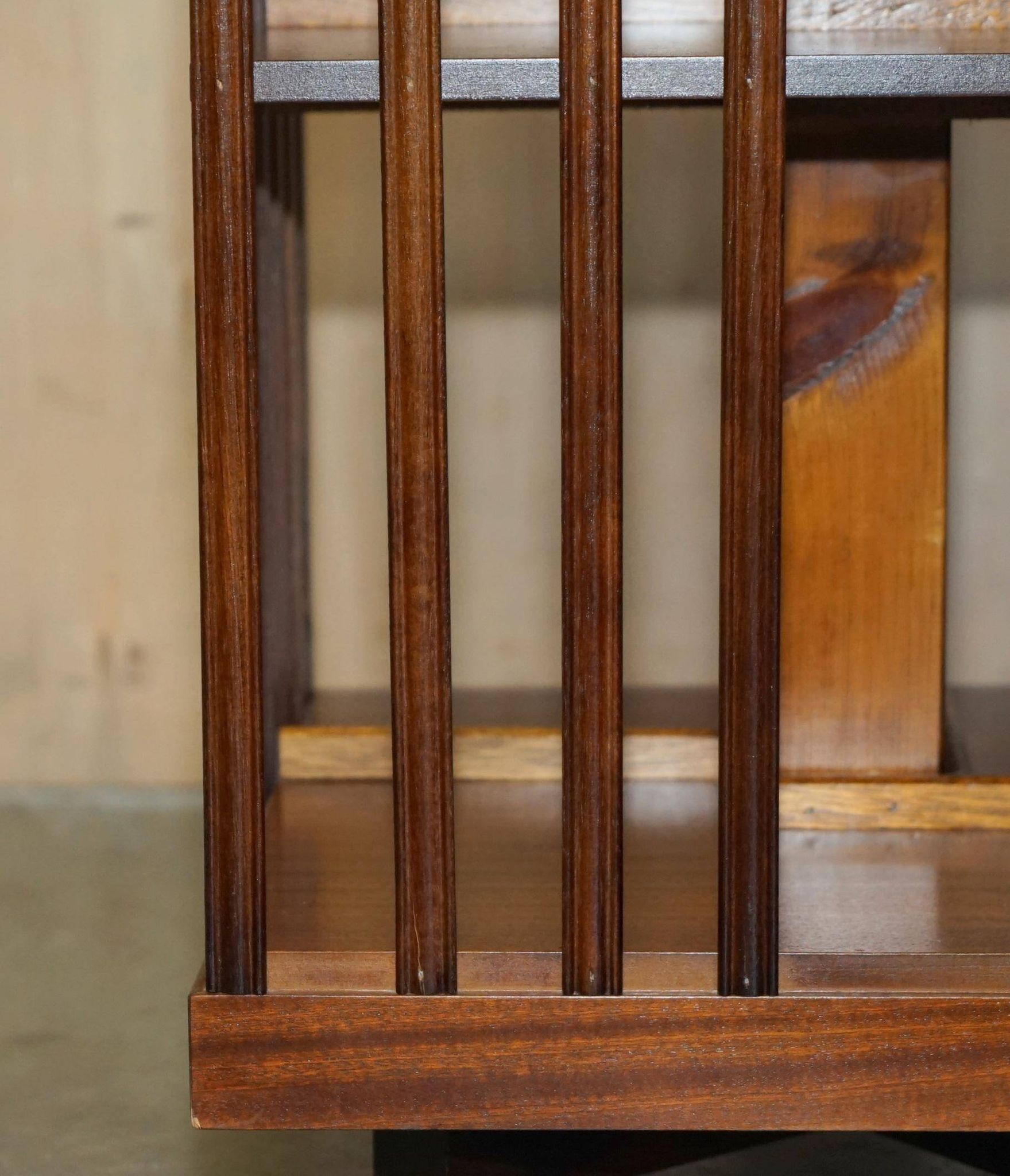 Sheraton Revival rotating library table in walnut and satin wood.