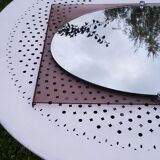 Mirror of the 70s entourage in smoked plexi