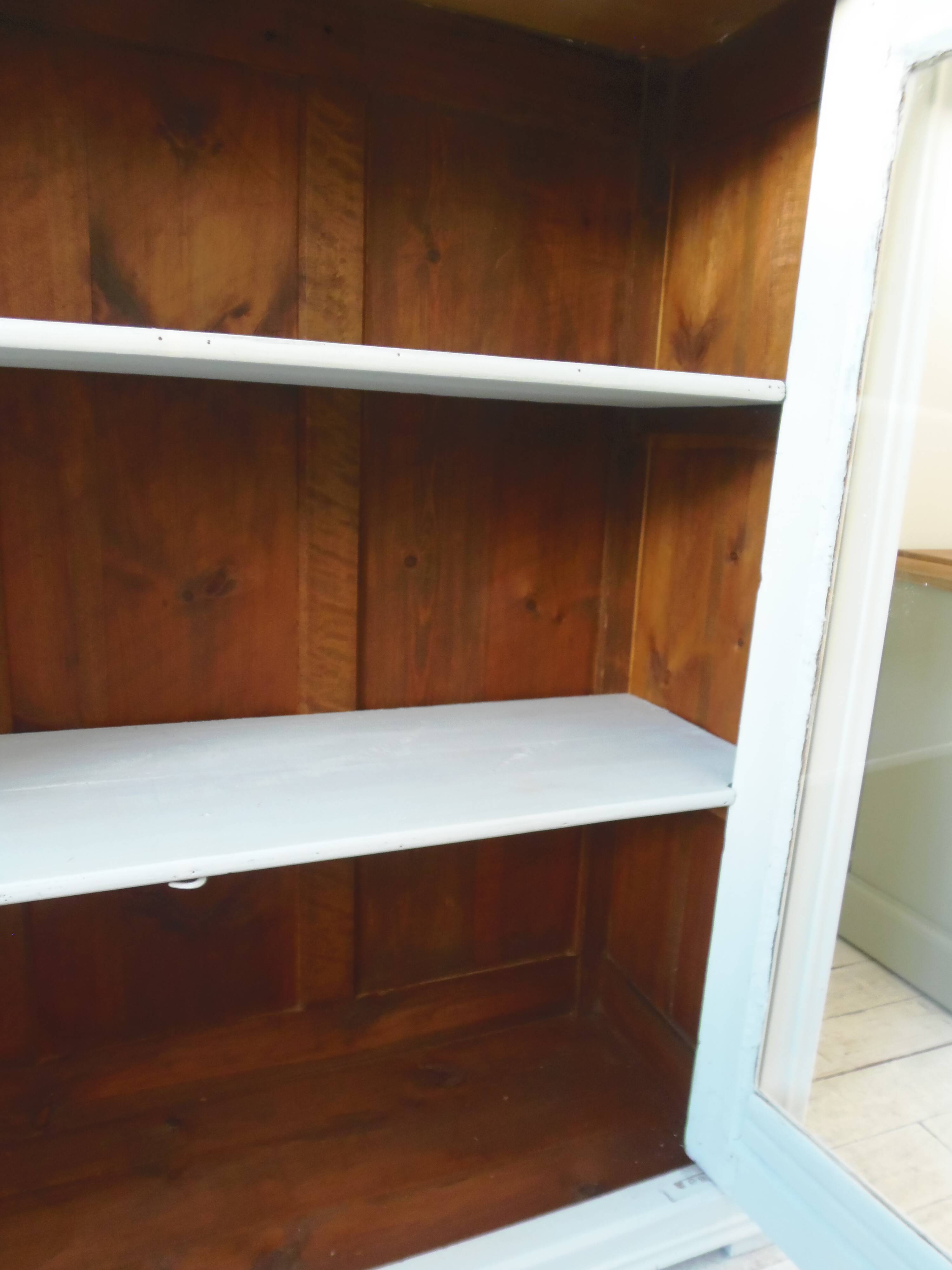 Display case, old shallow sideboard re-enchanted in cloud gray.