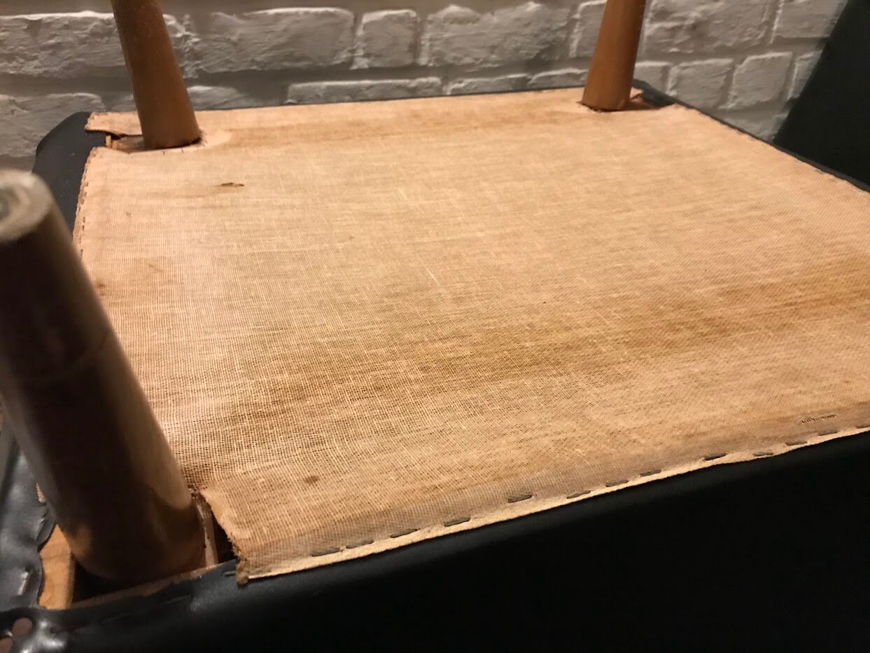 Vintage 60's armchair in black skai.