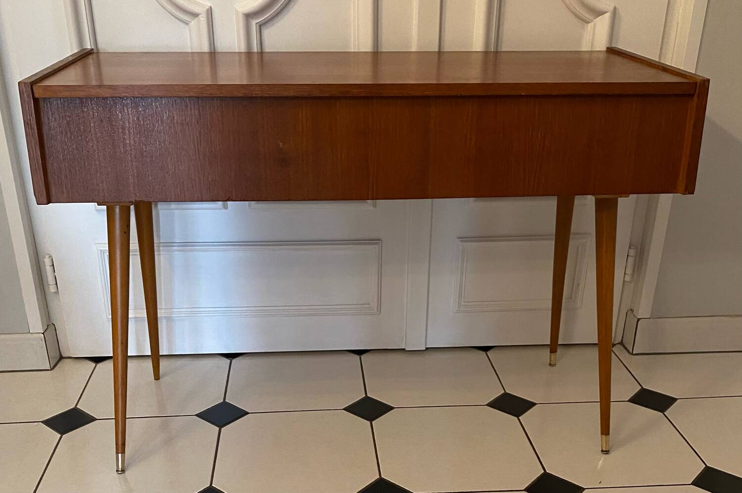 Vintage console with compass feet