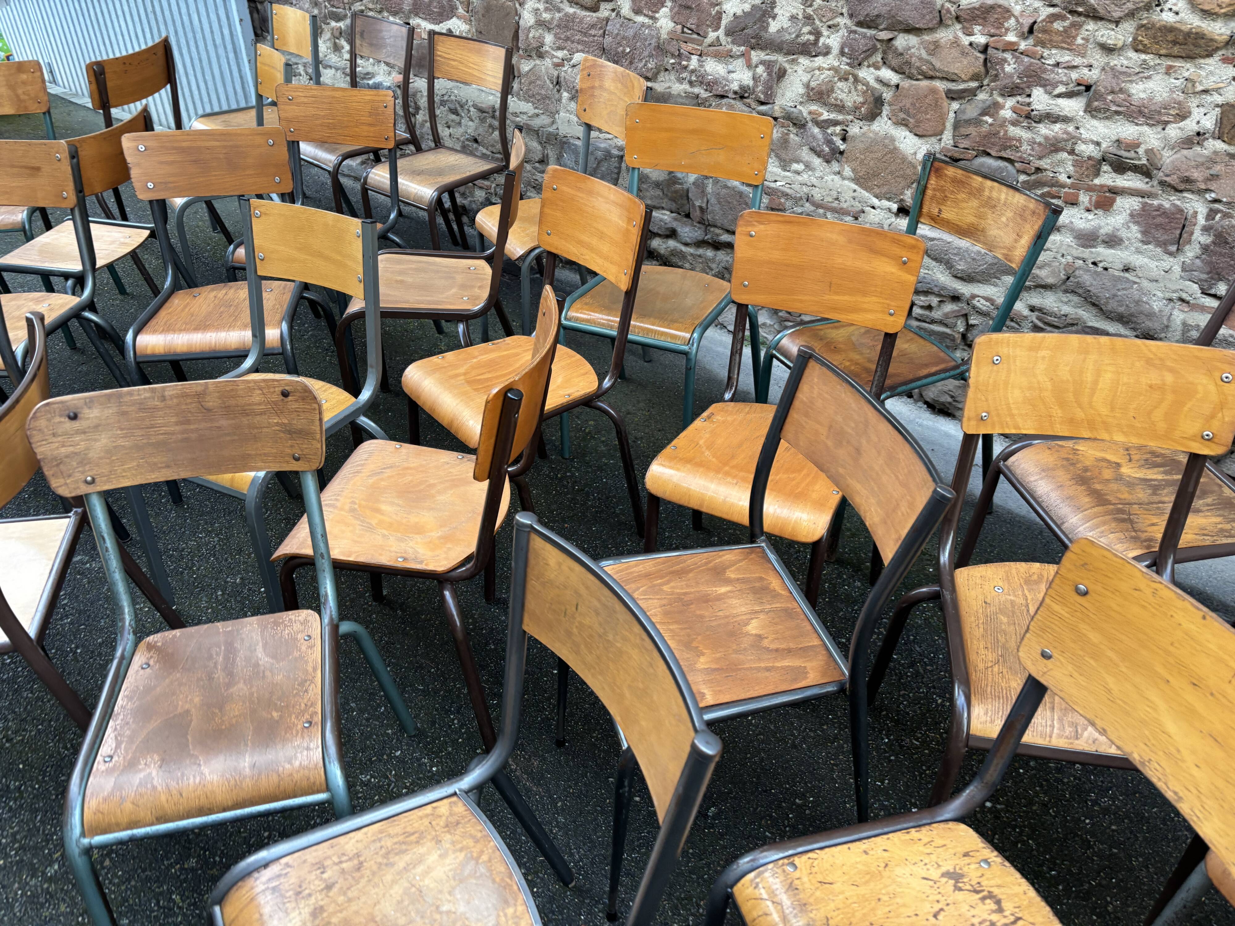 30 mismatched vintage industrial school chairs MULLCA tube & wood