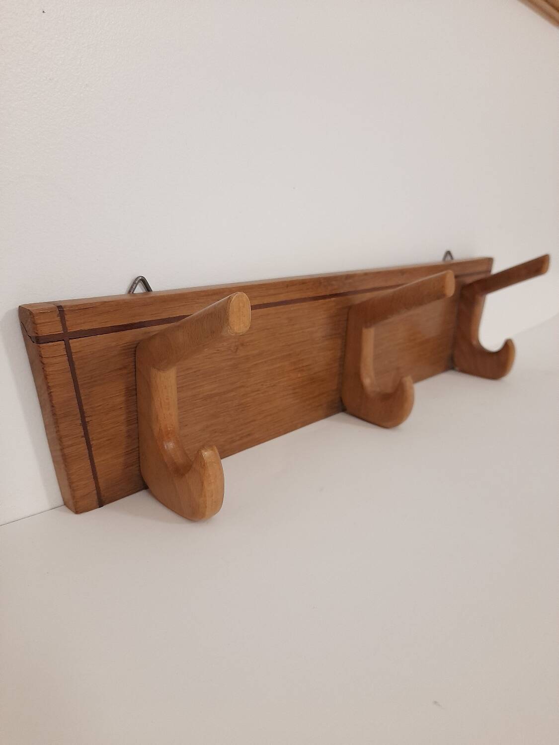 Pretty trapezoidal coat hook from the 60s