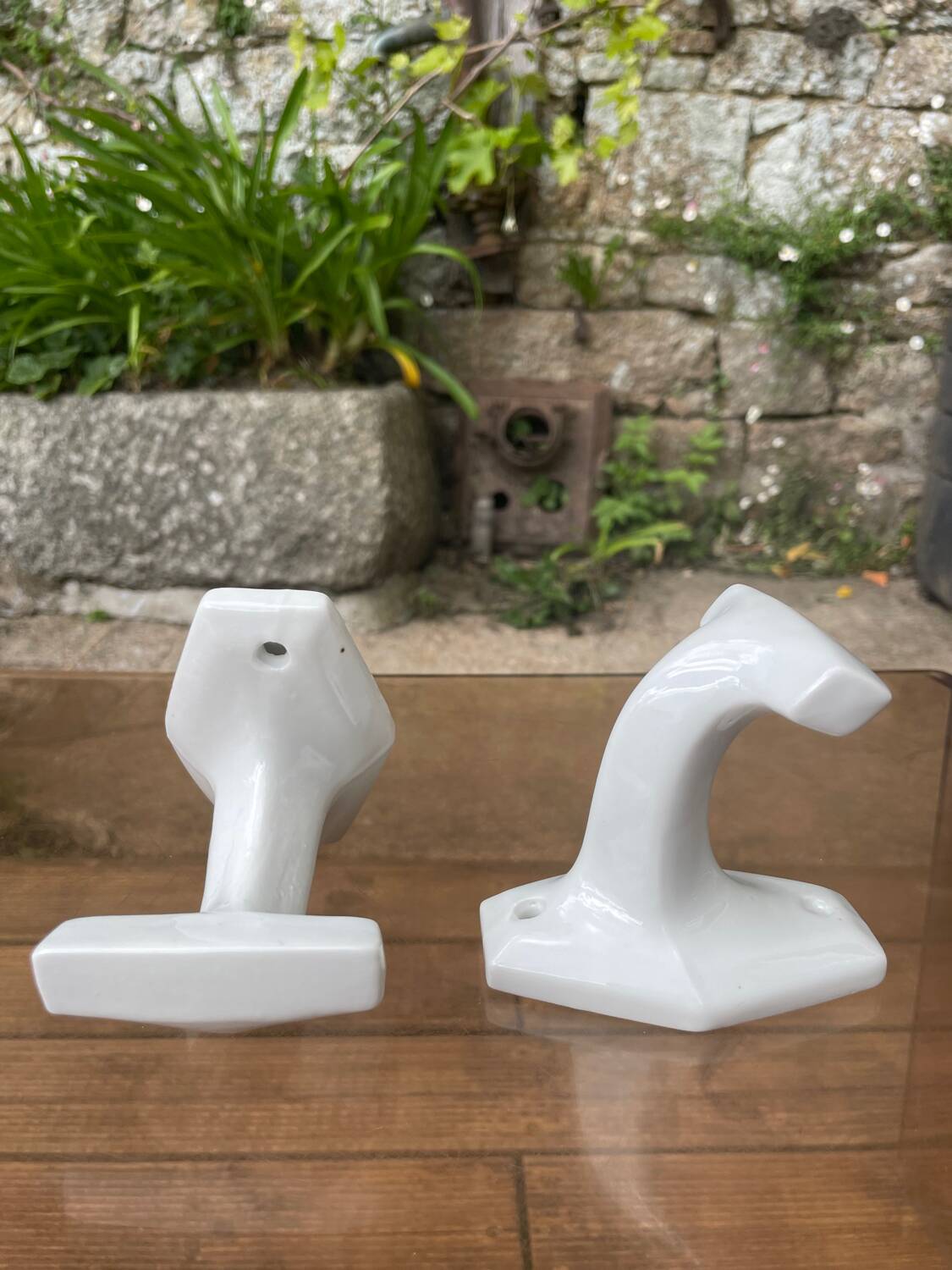 Duo of porcelain hooks