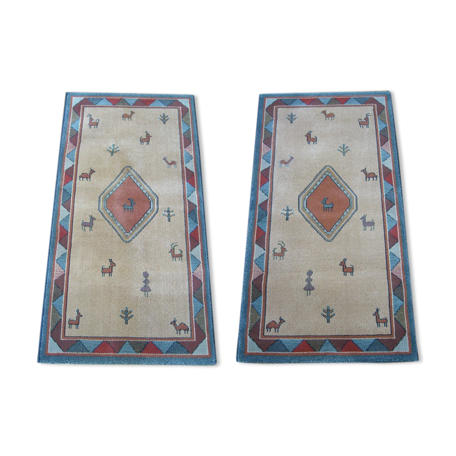 Pair of 60 x 120 Peruvian wool rugs