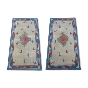 Pair of 60 x 120 Peruvian wool rugs