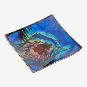Empty pocket in psychedelic enamelled leather