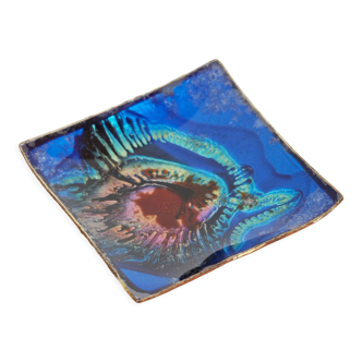 Empty pocket in psychedelic enamelled leather