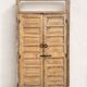 pair of old double-leaf doors with transom and carved frames