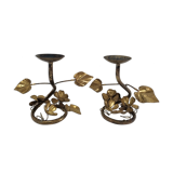 Pair of brass candle holders decorated with patinated metal flowers