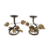 Pair of brass candle holders decorated with patinated metal flowers