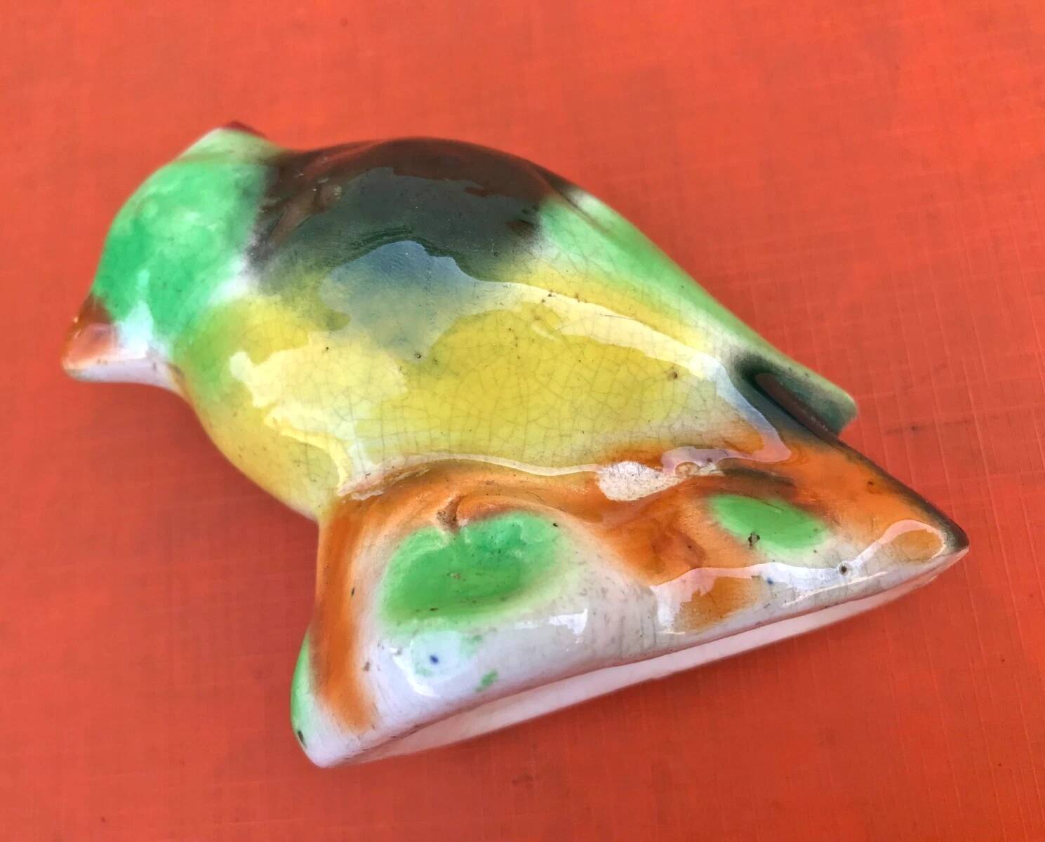 Polychrome ceramic parrot shape