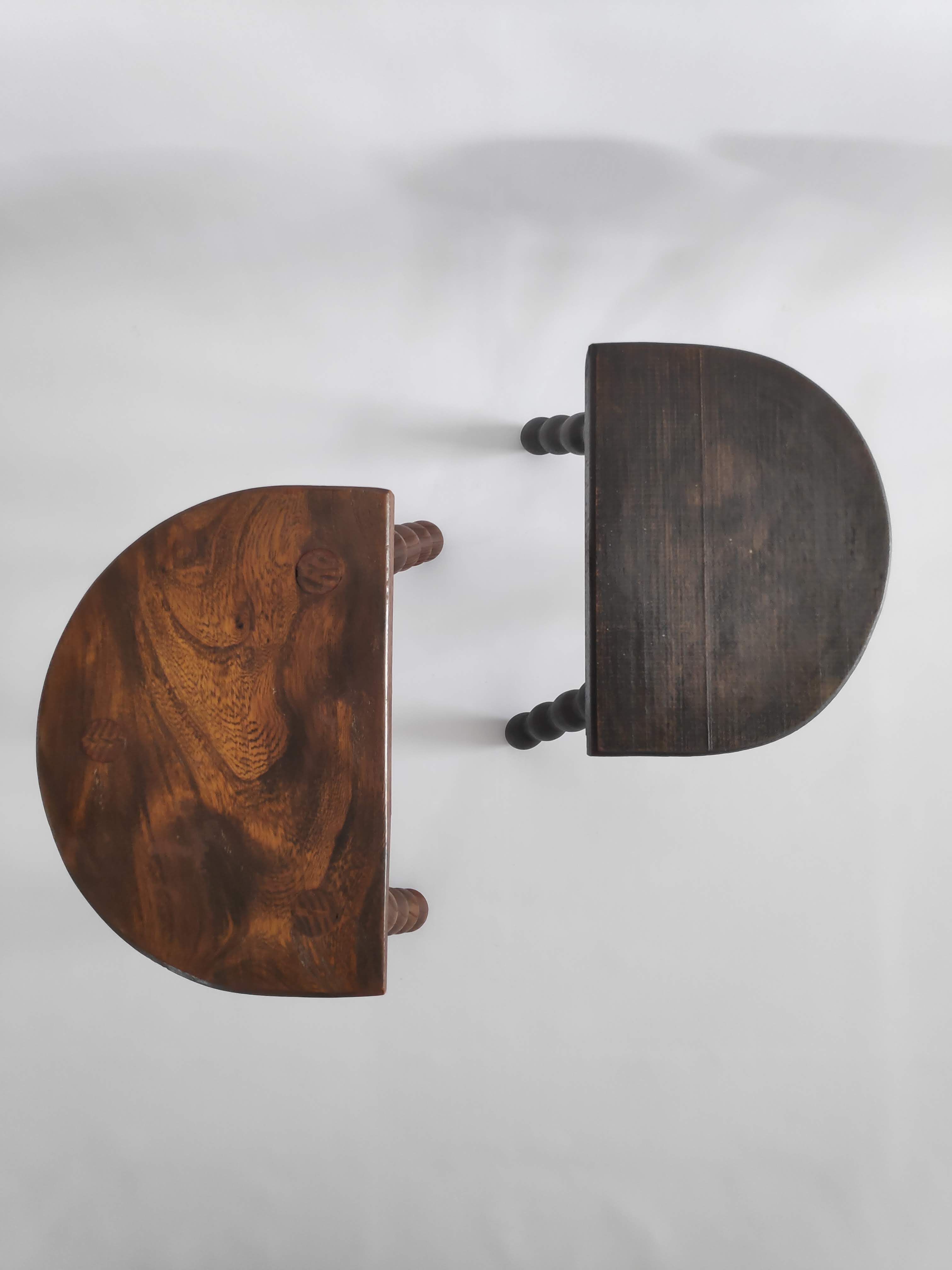 Pair of vintage tripod stools with turned wooden feet