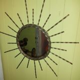 Miroir soleil en fer forgé.