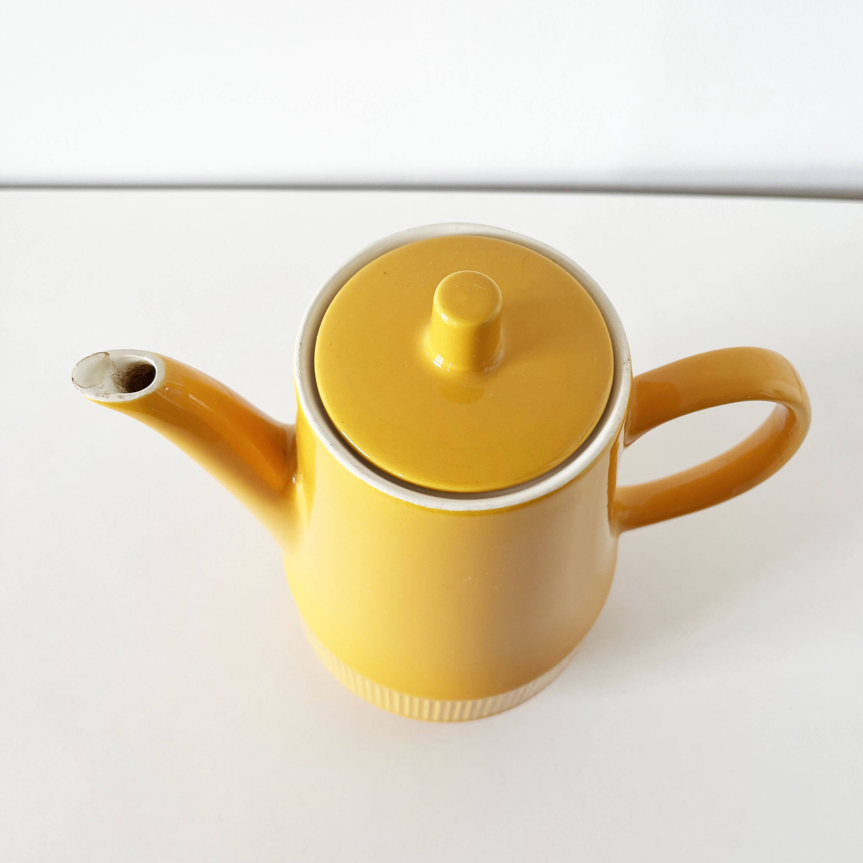 Old yellow ceramic coffee or teapot 1960