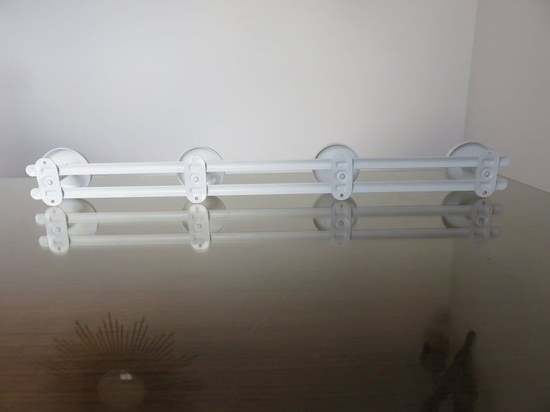 White metal coat holder in 70s