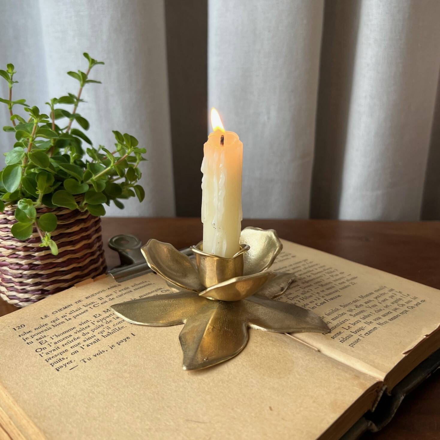Small brass “flower” candle holder