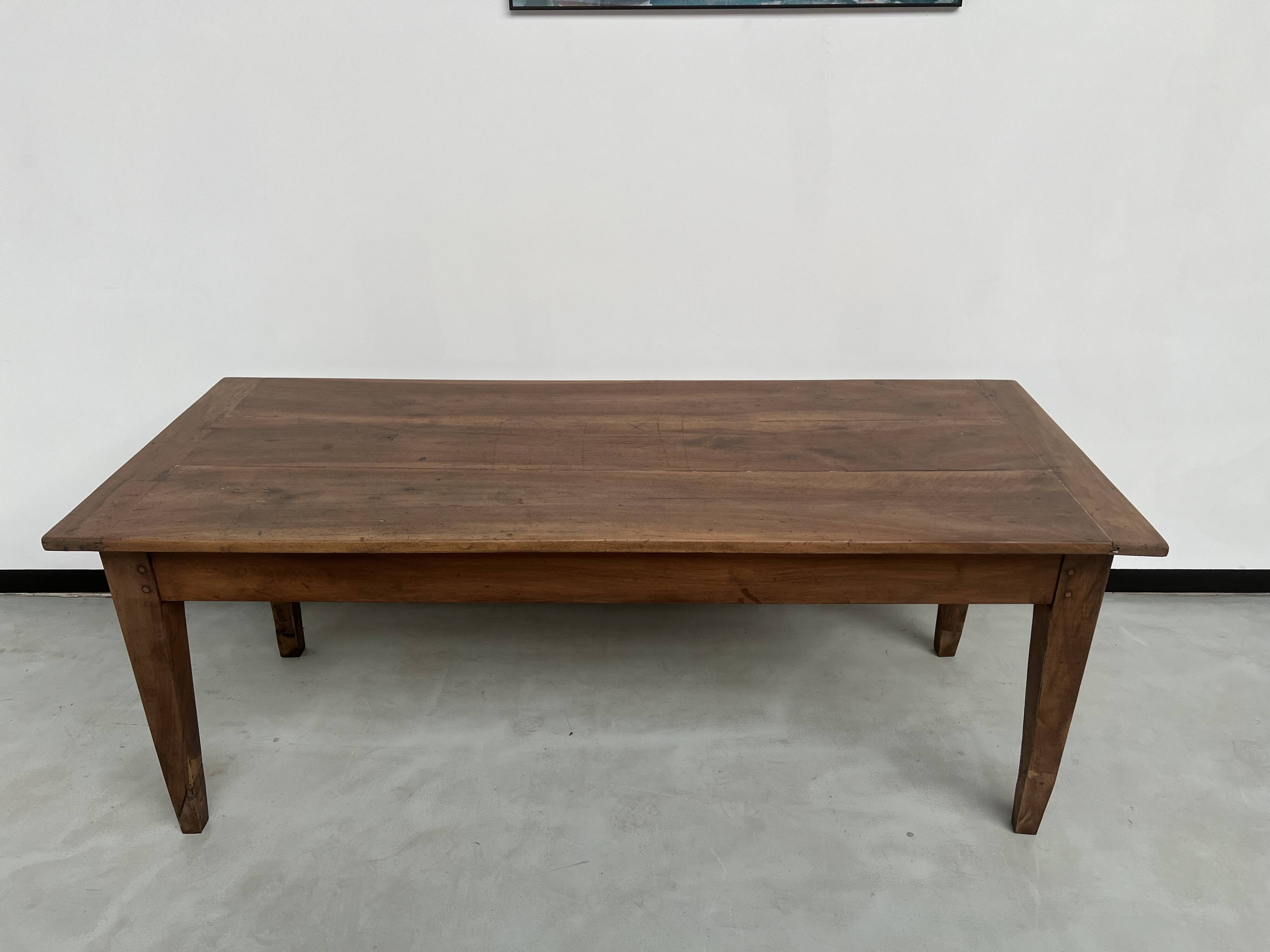 Solid walnut farmhouse table with spindle legs