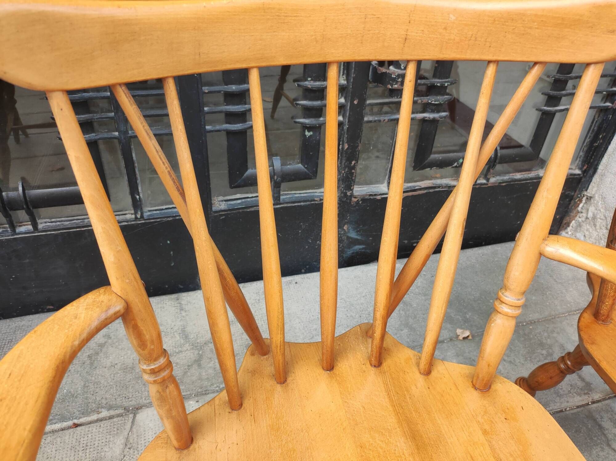 Four chairs and a Heywood Wakefield Windsor armchair. Vintage