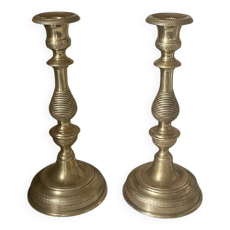 Antique pair of gilded bronze candlesticks