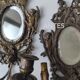 Pair of old French wall lights with beveled mirror and putti