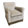 Velvet armchair with fringes