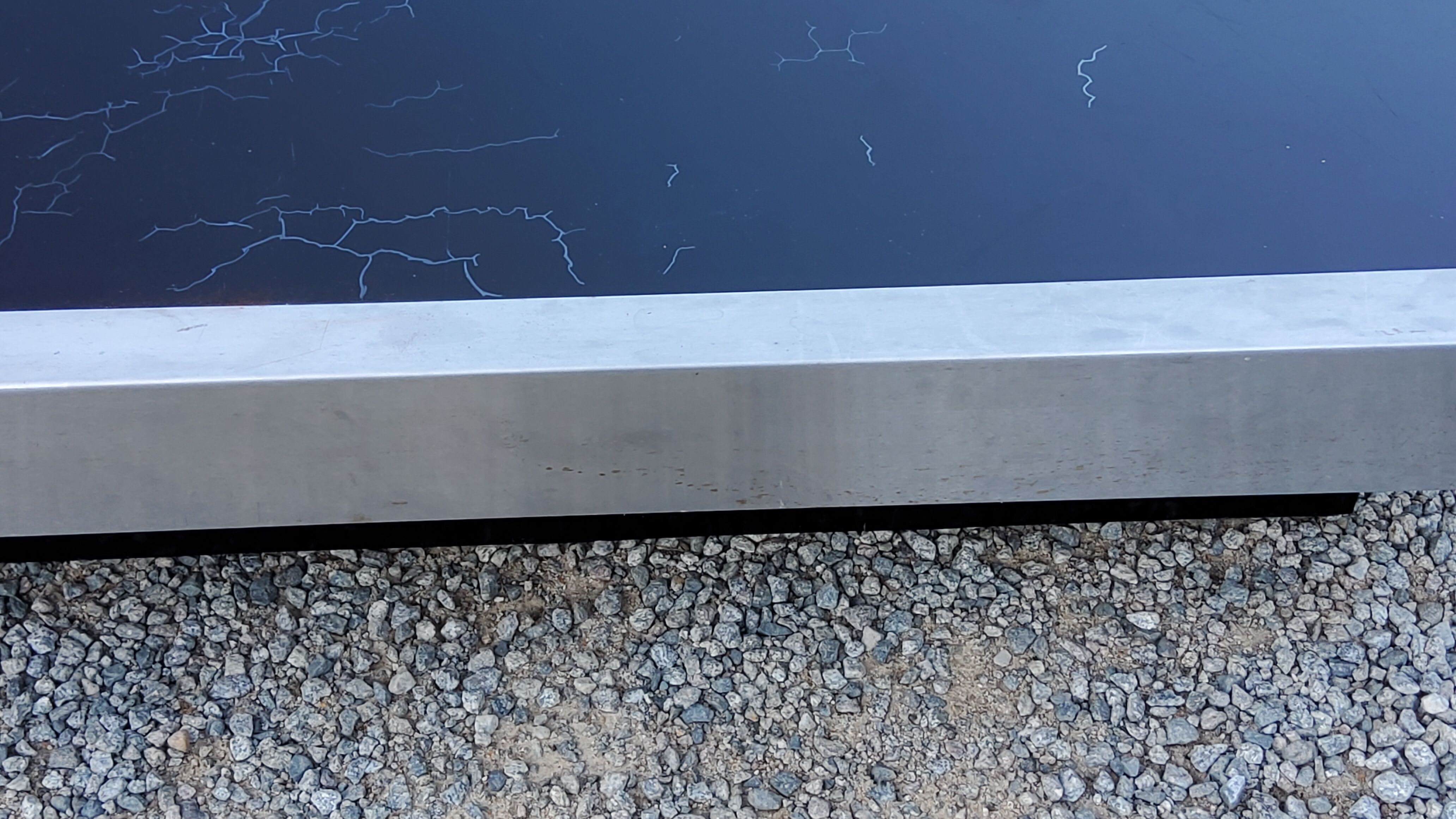 Coffee table in brushed steel and black tinted glass from the 70s
