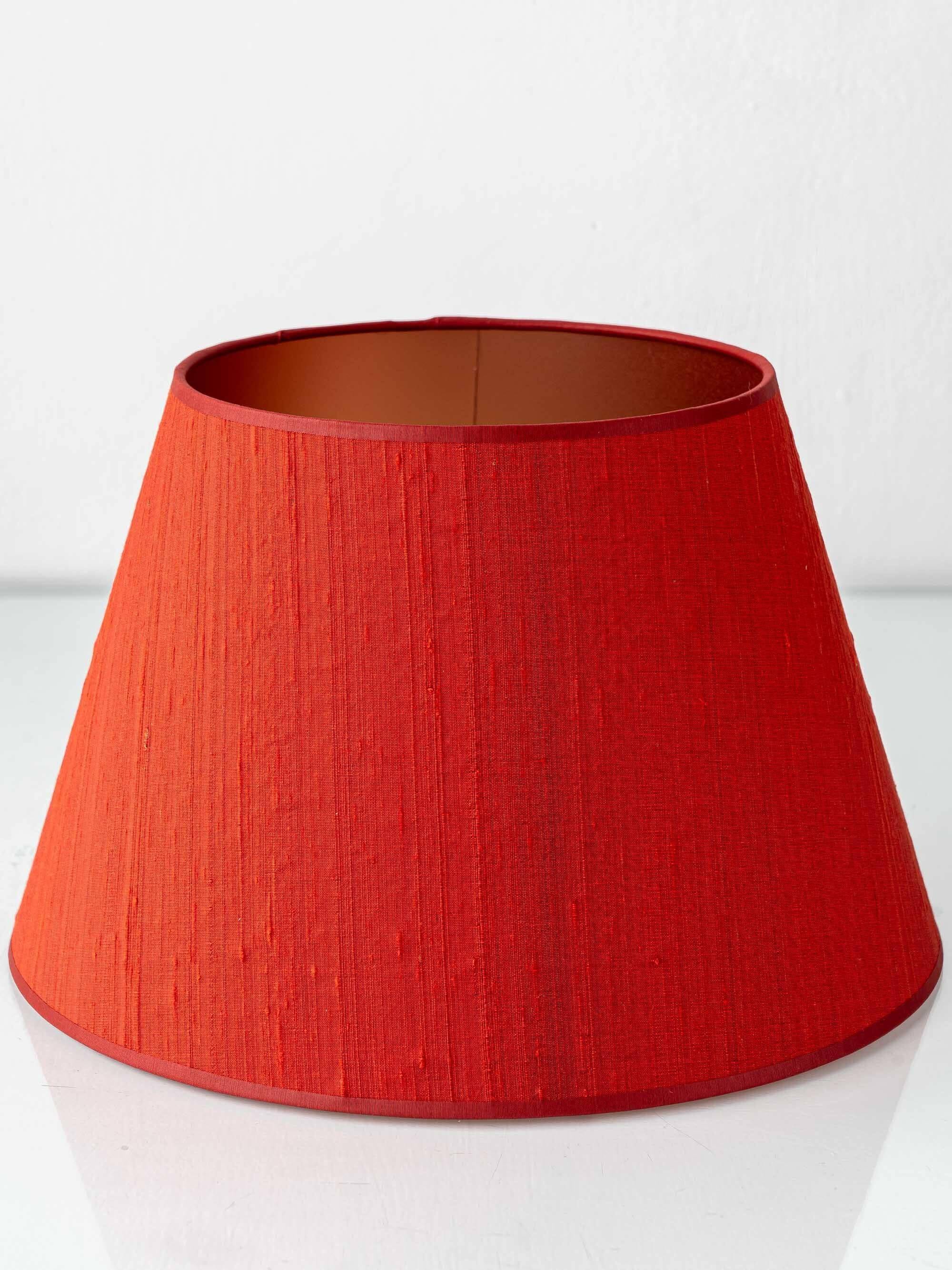 Pair of Royal Delft blue and white ceramic table lamps with new vermilion silk shades.