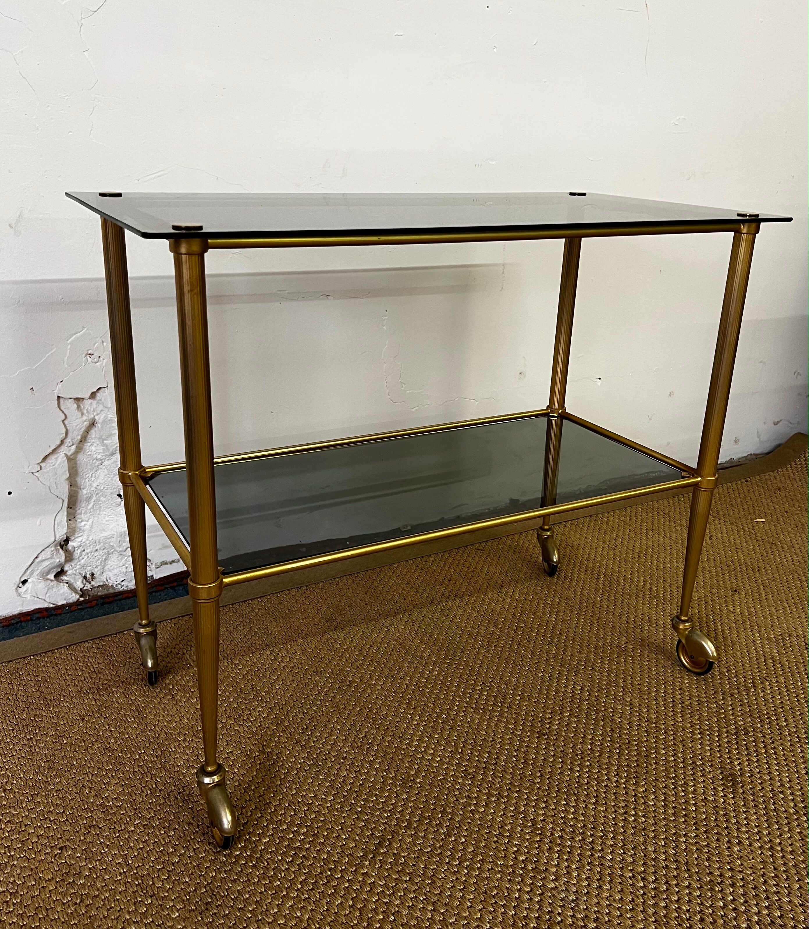 Console / desserte en laiton et verre fumé