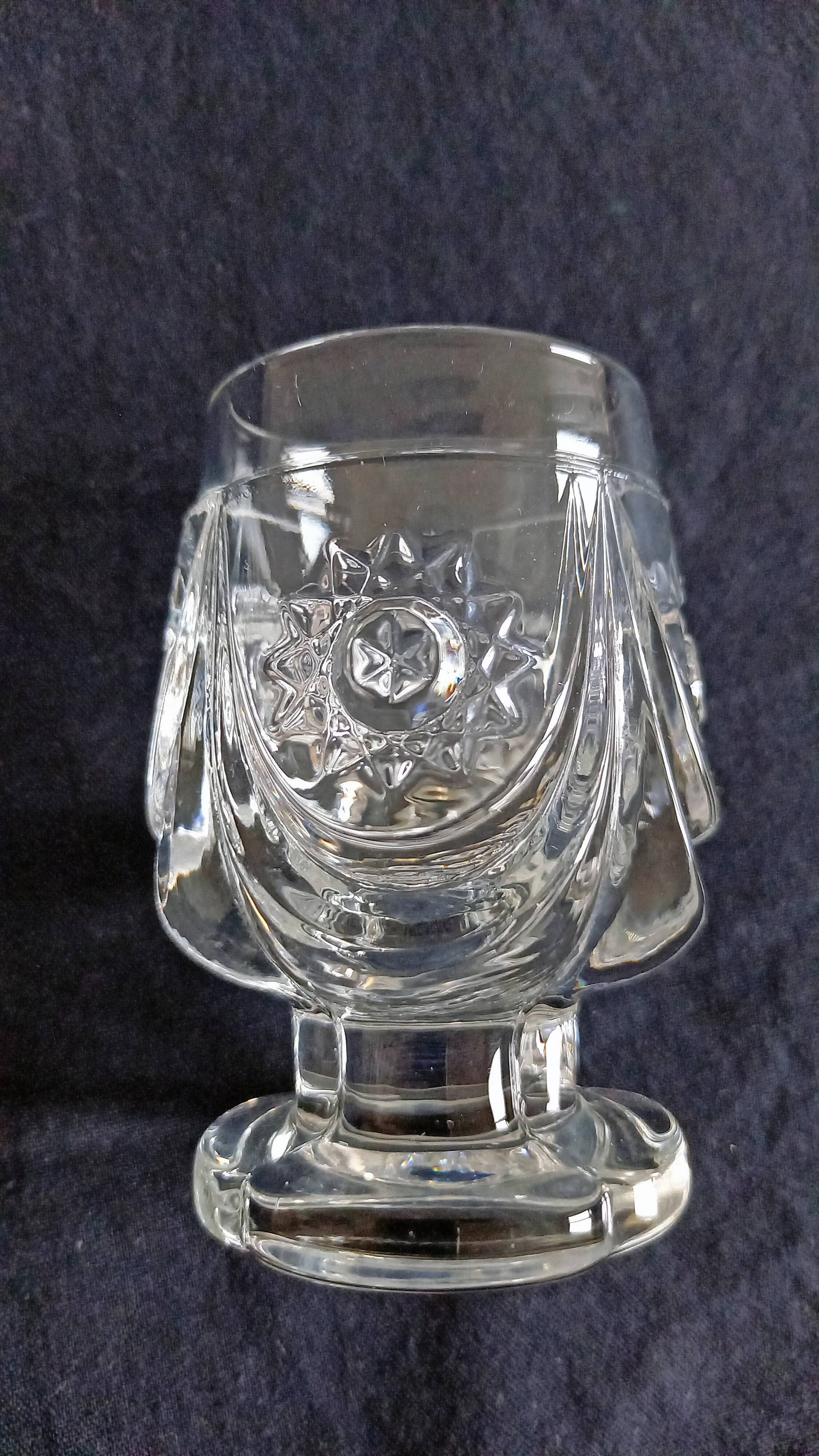 4 antique to digestive glasses in cut crystal and molded crystal decorated