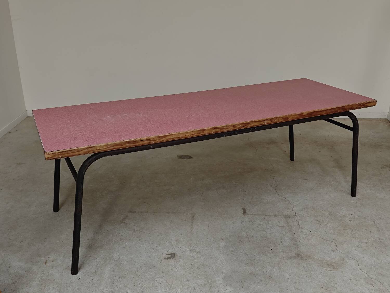 Large canteen table in pink formica and metal.