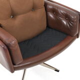 Danish swivel lounge chair in brown leather