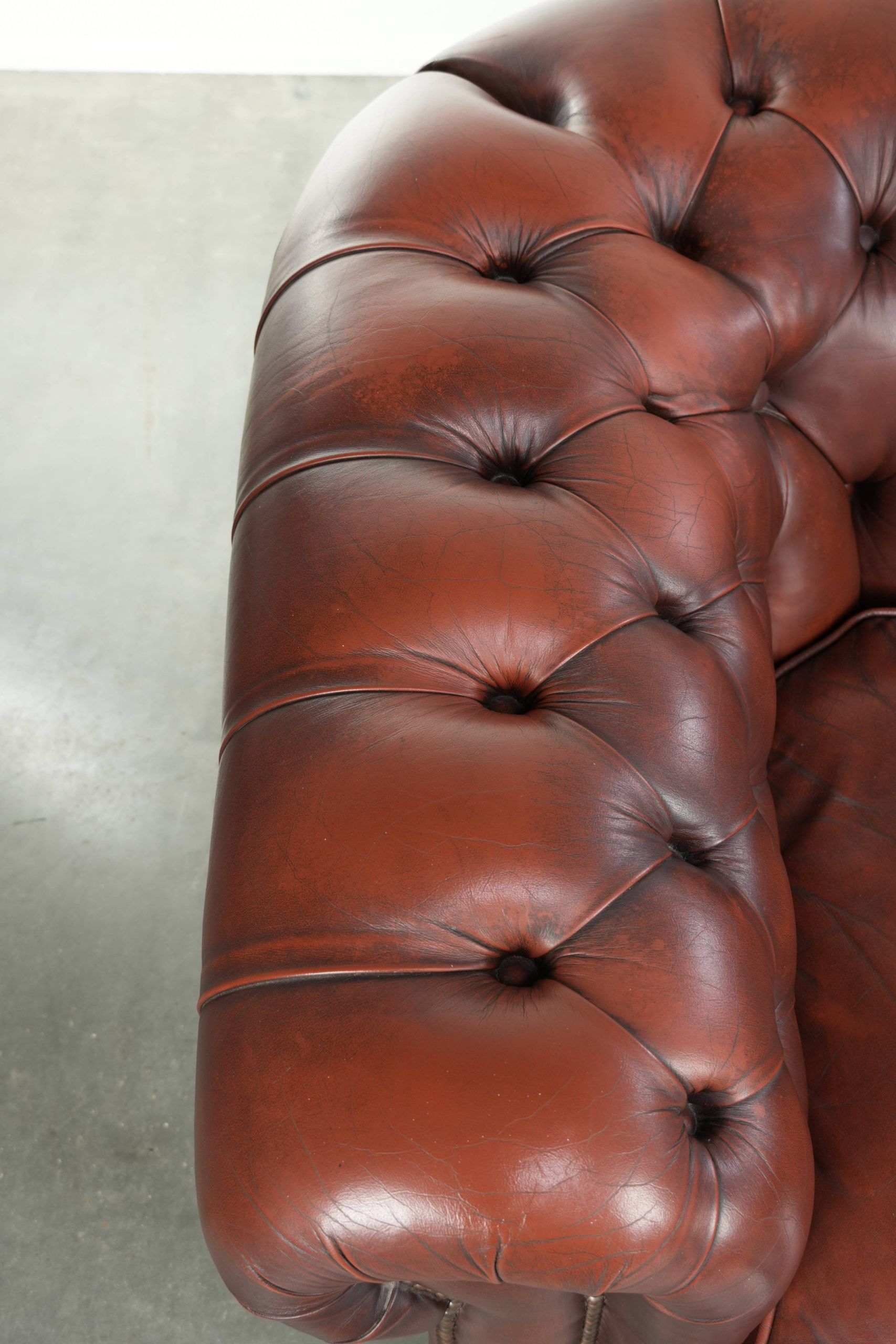 Cowhide Chesterfield armchair in a classic English style