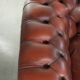 Cowhide Chesterfield armchair in a classic English style