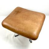 Brown leather ottoman on chrome base