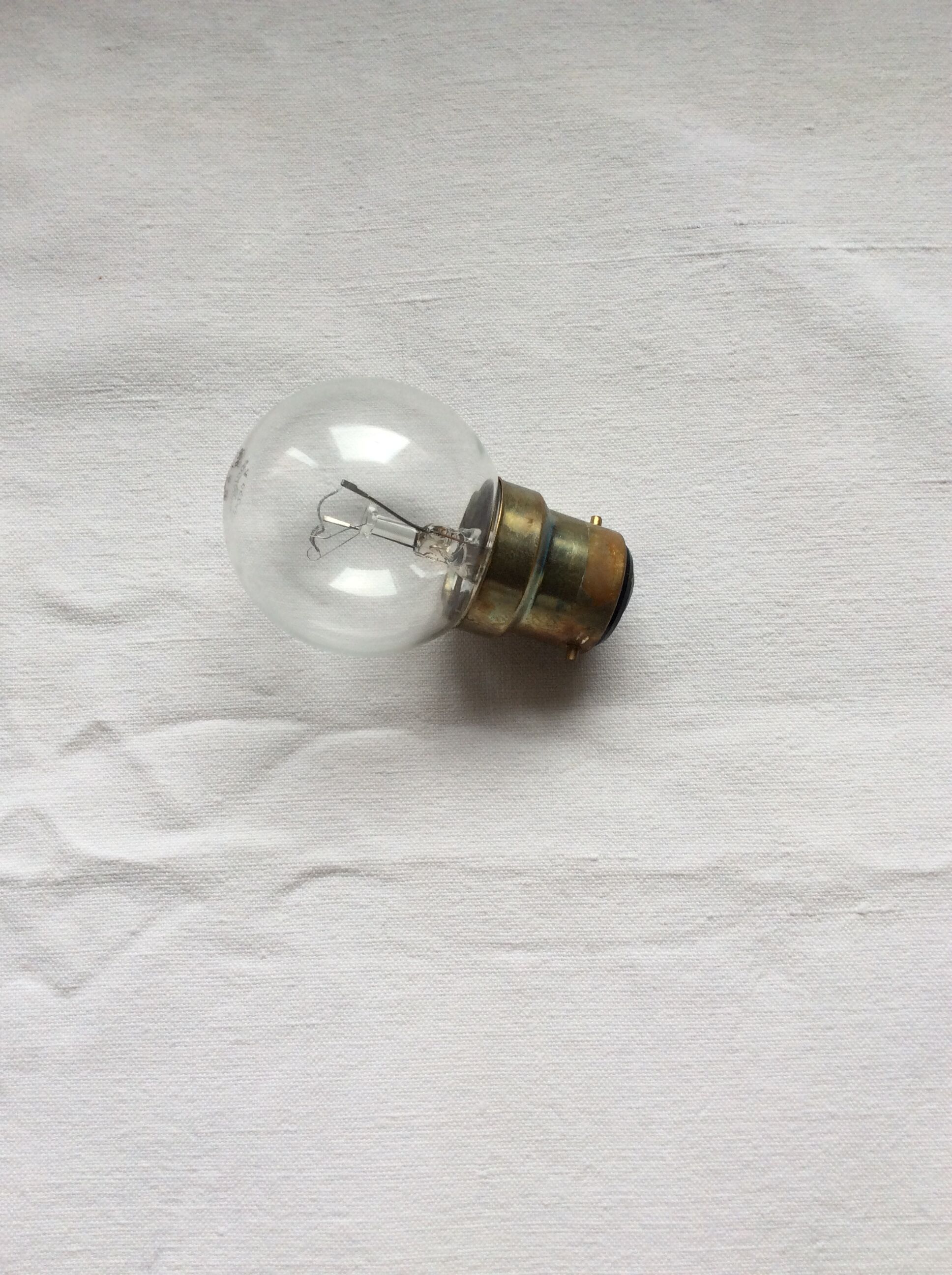 Amber glass suspension with brass